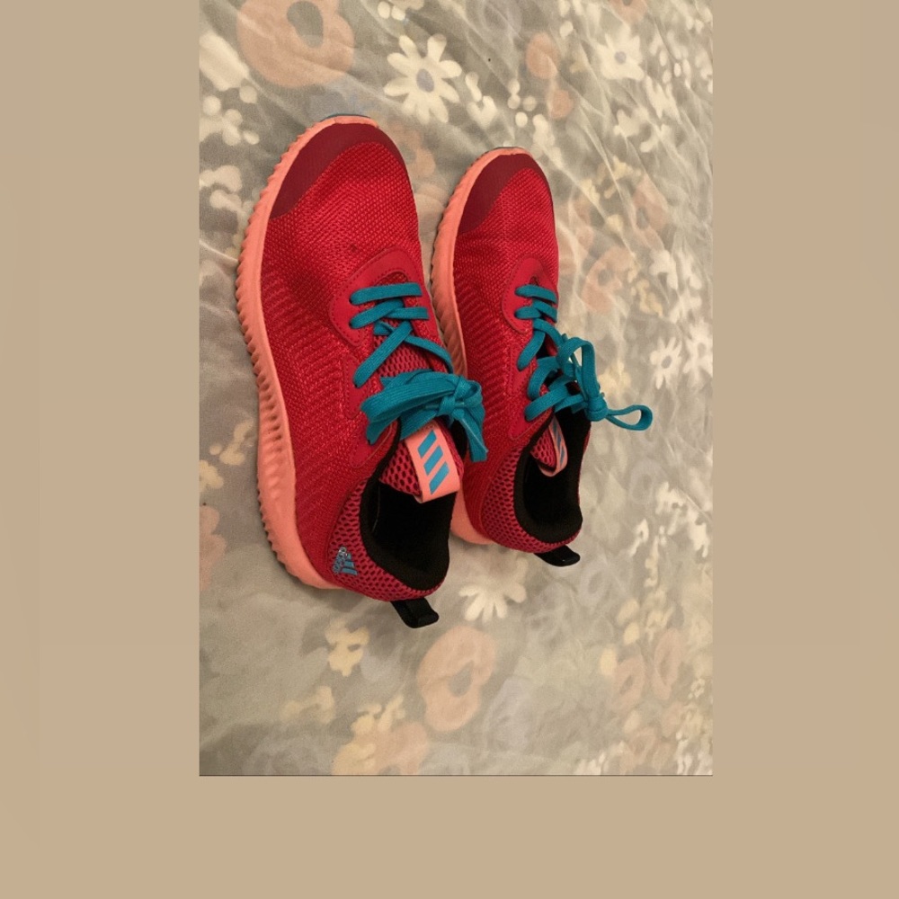 Hot pink adidas running shoes